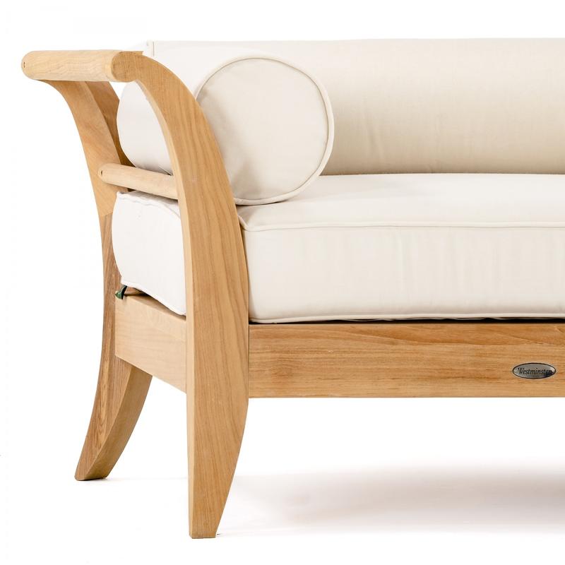 alt="16765 Aman Dais teak Corner Sectional in closeup view with bolsters and cushion on white background"