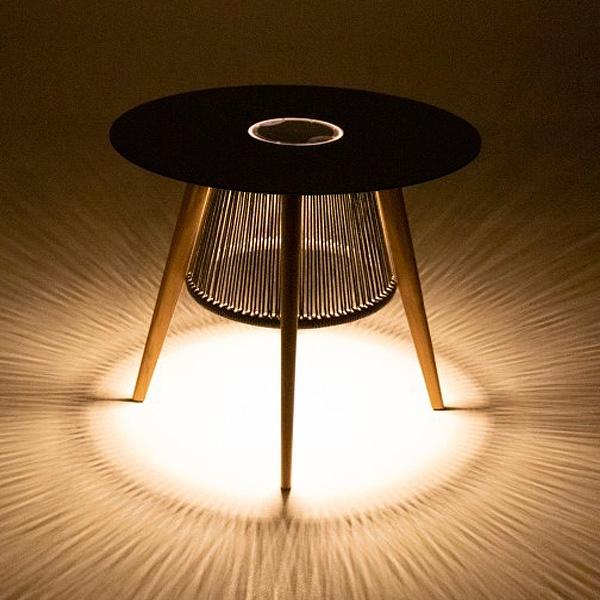 alt="45103 Luna Small 30 inch round Table showing light reflecting from bottom in angled side view on white background"