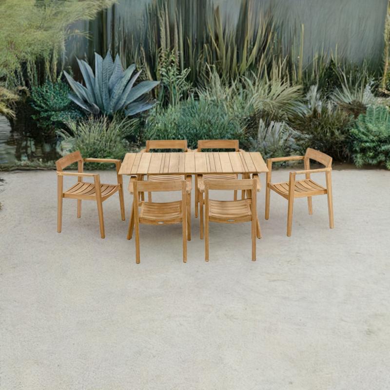 alt="70524 Surf Horizon teak 7 pc rectangular Dining Set of Surf Teak Rectangular Table and 6 Horizon Dining Chairs angled side view on patio with privacy wall lined with succulent plants in the background"