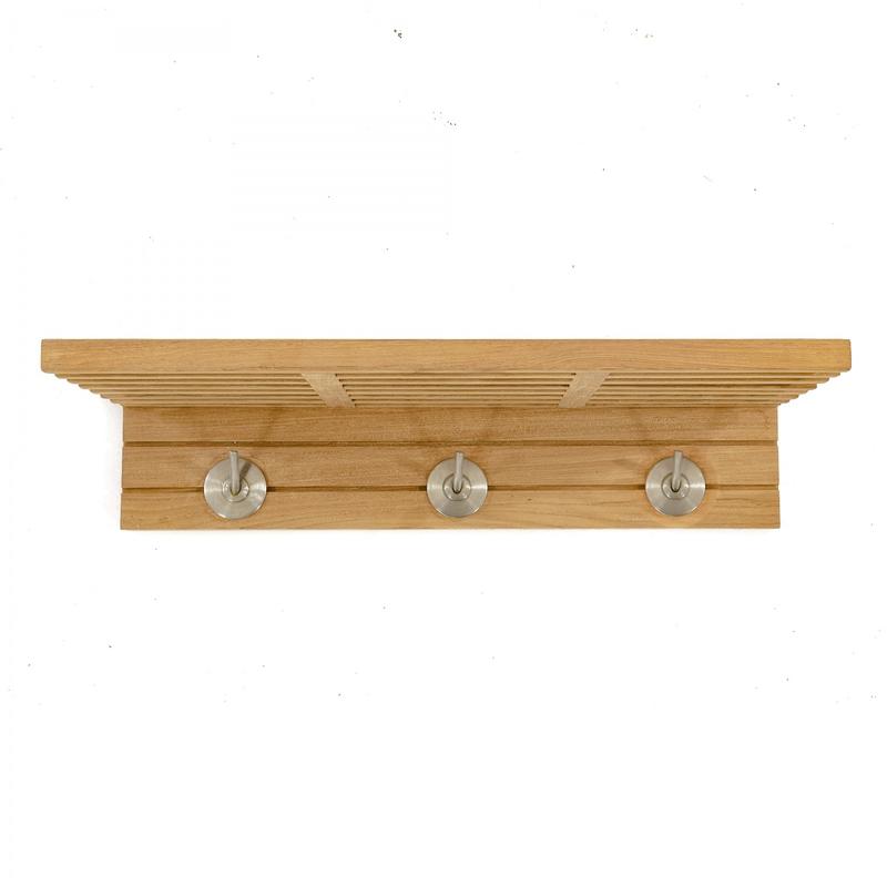 alt="18730 Pacifica Towel Shelf front view hanging on wall showing hooks on white background"