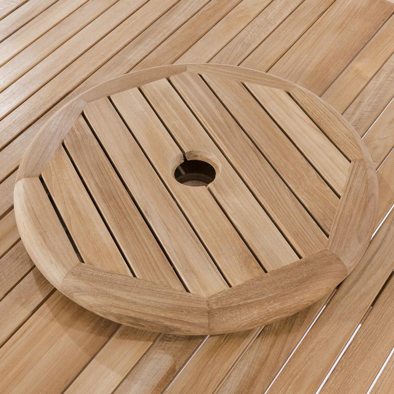 alt="18700 teak lazy susan showing umbrella hole on teak table angled on white background"