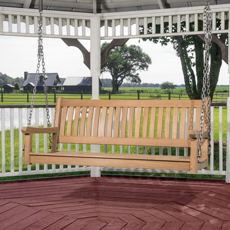 alt="13955BO swinging veranda bench in gazebo overlooking grass and barn in background"