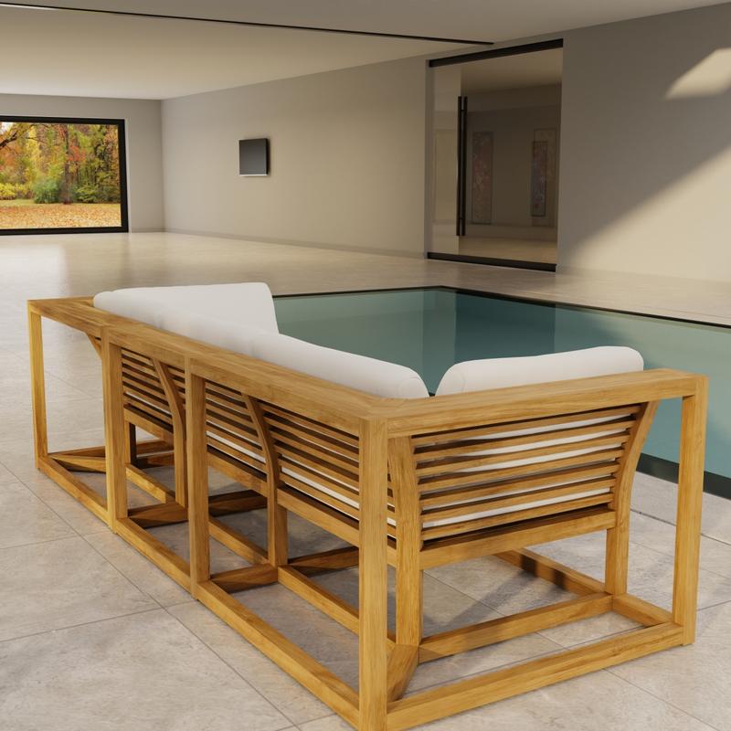 alt="70277 Maya Deep Seating Sofa of Maya Right Side Sofa Sectional and Corner Sectional in angled back view on patio facing pool next to glass door of house with  trees in background"