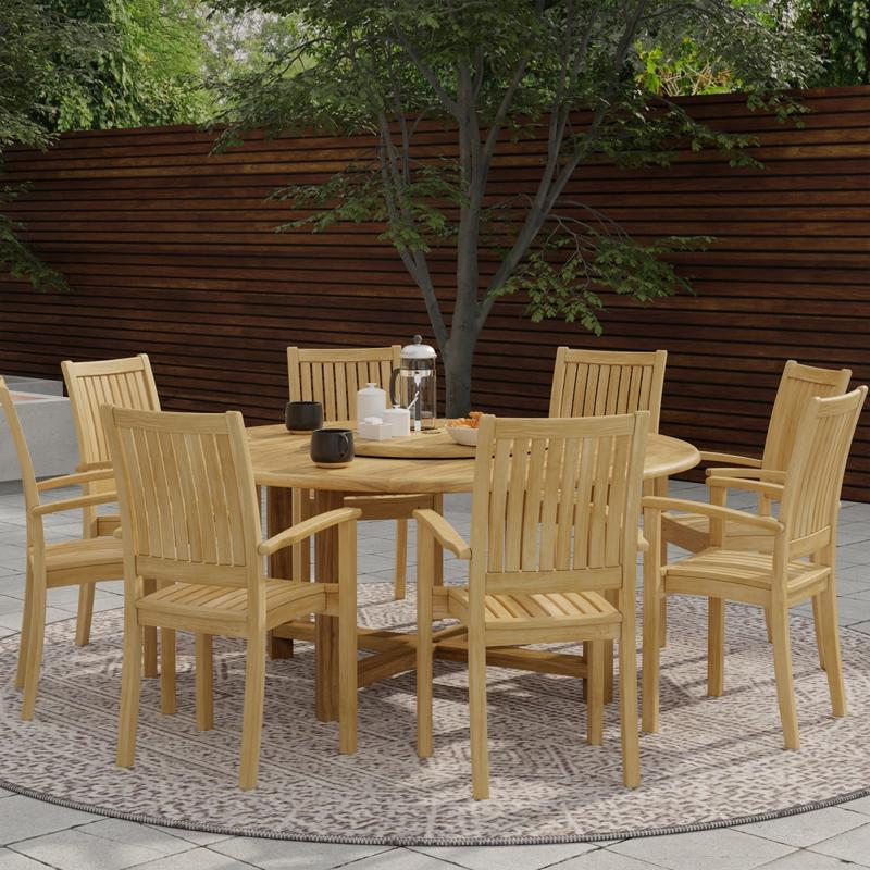 alt="70154 Buckingham 9 piece teak Dining Set of 8 armchairs and round teak dining table with 2 coffee cups and carafe with sugar bowl and creamer on lazy susan with privacy fence background"