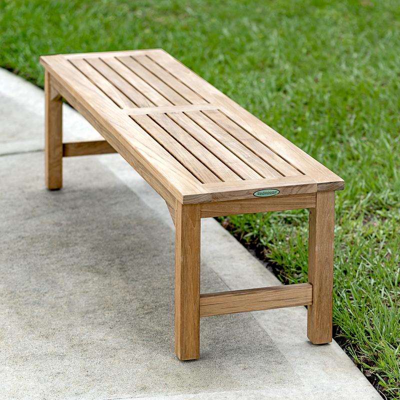 alt="13929 Veranda teak 5 foot long Backless Bench aerial end view on concrete walkway with grass in background"