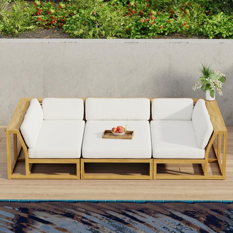 alt="70274 Maya 3pc Daybed on patio in aerial front view with tray of fruit on middle daybed section facing a pool next to a potted plant with privacy wall with shrubs and trees in background"