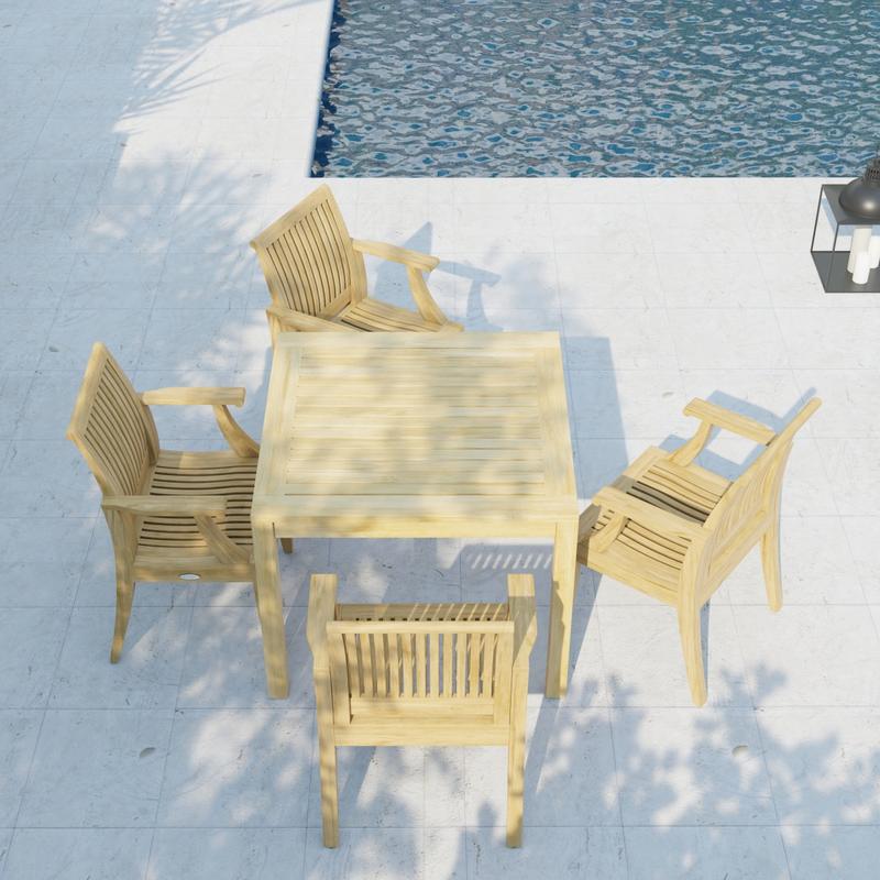 alt="70555 Laguna 5 pc Square Dining Set of Bistro 36 inch Square Teak Dining Table and 4 Laguna Dining Armchairs in aerial view on pool deck with pool in the background "