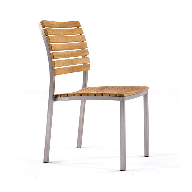 alt="21007 Vogue teak and 304 stainless steel side chair in side view angled on white background"