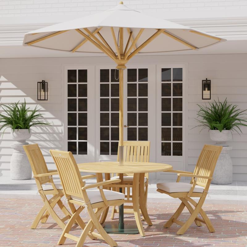 alt="70043 Grand Hyatt Barbuda 5 pc Patio Dining Set with optional round umbrella angled side view on a brick patio with french doors and 2 ferns in the background"