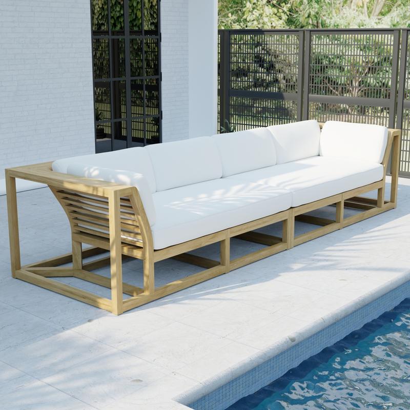 alt="70278  Maya Grand Sofa Set of Maya Left and Right Side Sectional in angled side view on a patio facing a pool and a house with a window and a fence with trees in the background"