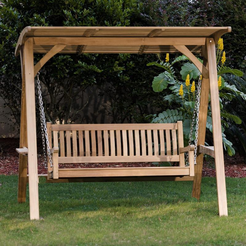 alt="13955bo veranda swinging porch bench with canopy on grass field with trees in background"