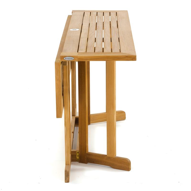 alt="15663S Nevis Drop Leaf Teak Table in angled view end of table with one side down on white background"