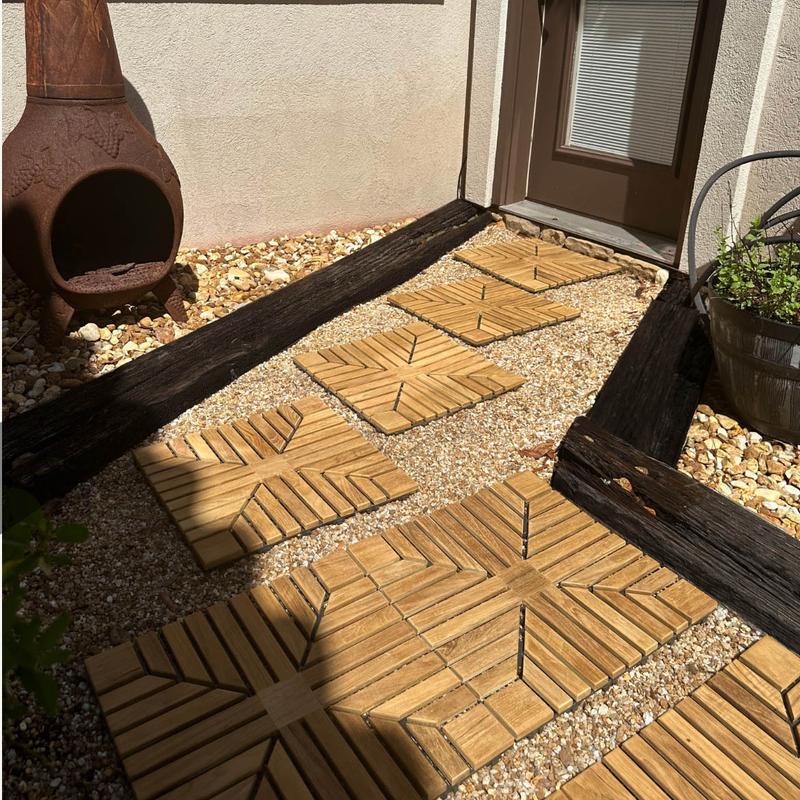 alt="18408P diamond teak tiles showing some connected on a walkway leading to a door with chimenea and landscaping rocks in background"
