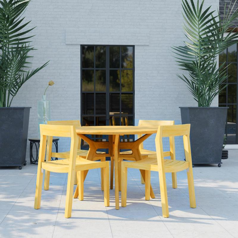 alt="70355 Horizon Surf 5 pc Cafe Dining Set in side view on stone patio with 2 potted plants and window in the background"
