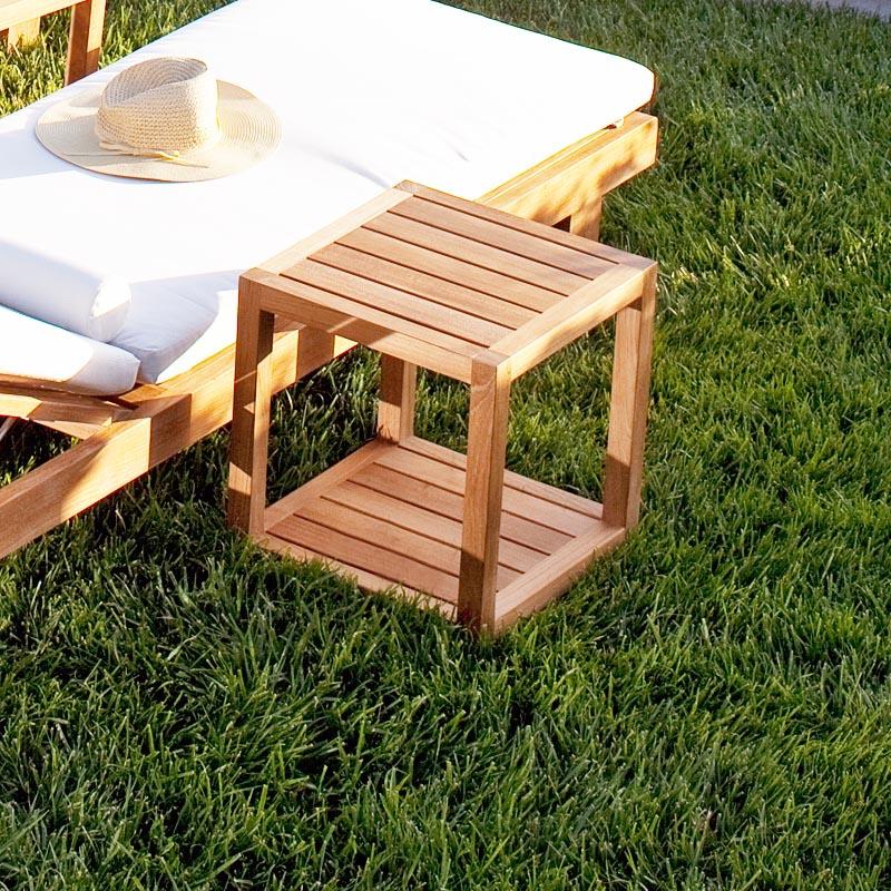 alt="14810 Horizon Teak Side Table on grass with Horizon loungers in background"