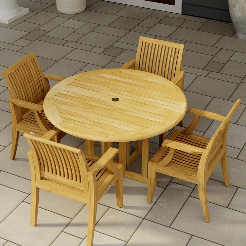 alt="70736 Barbuda Laguna Dining Set of Barbuda 4 ft Round Dining Table and 4 Laguna Arm Chairs on tiled patio aerial view of table top"