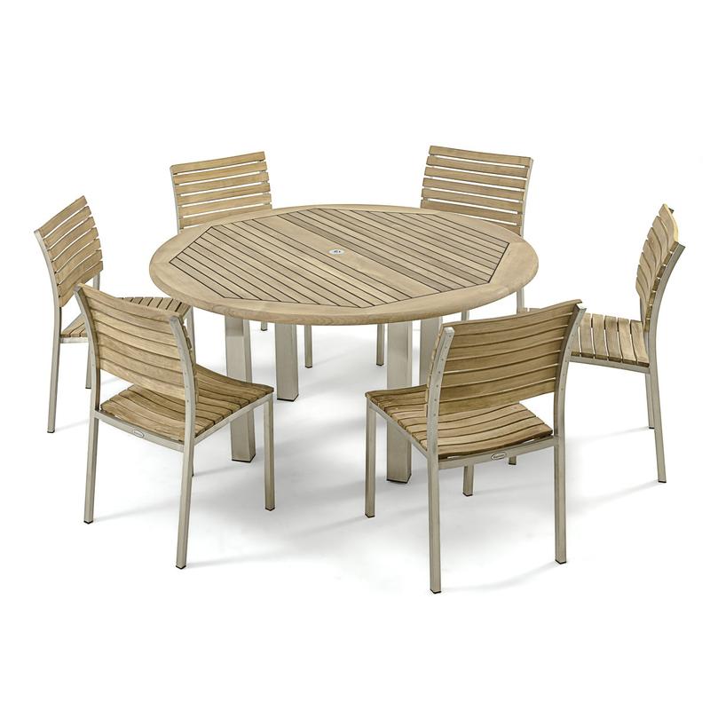 alt="25014 Vogue teak and stainless steel 5 foot Round Table with the 7 piece Vogue Teak Dining Set angled on white background"
