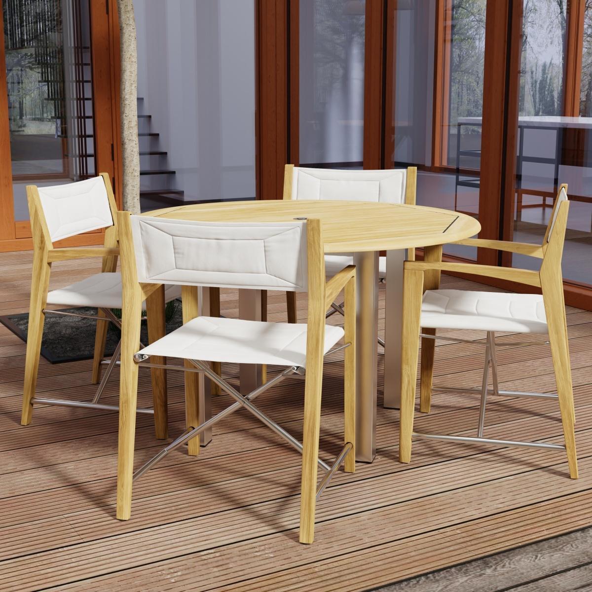 70619 Vogue Odyssey 5 pc Round Dining Set of Vogue Dining Table and 4 Odyssey Folding Chairs angled side view on patio with glass doors in the background