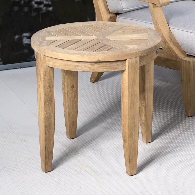 alt="14140  laguna teak side table on patio with laguna deep seating chair in background"
