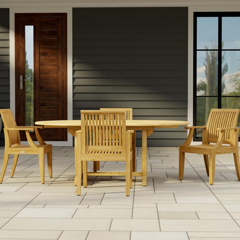 alt="70305 Martinique 5 piece Dining Set in side view on stone patio with house window and door in background"