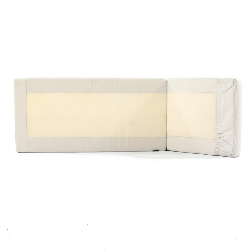 alt="30002dp Malaga synthetic wicker chaise lounger cushion on its side bottom view on white background"