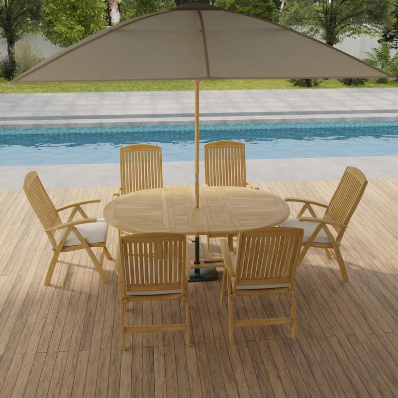alt="70367 Martinique Barbuda Recliner Dining Set with optional open umbrella aerial side view on patio in front of pool with plants and fence in background  "