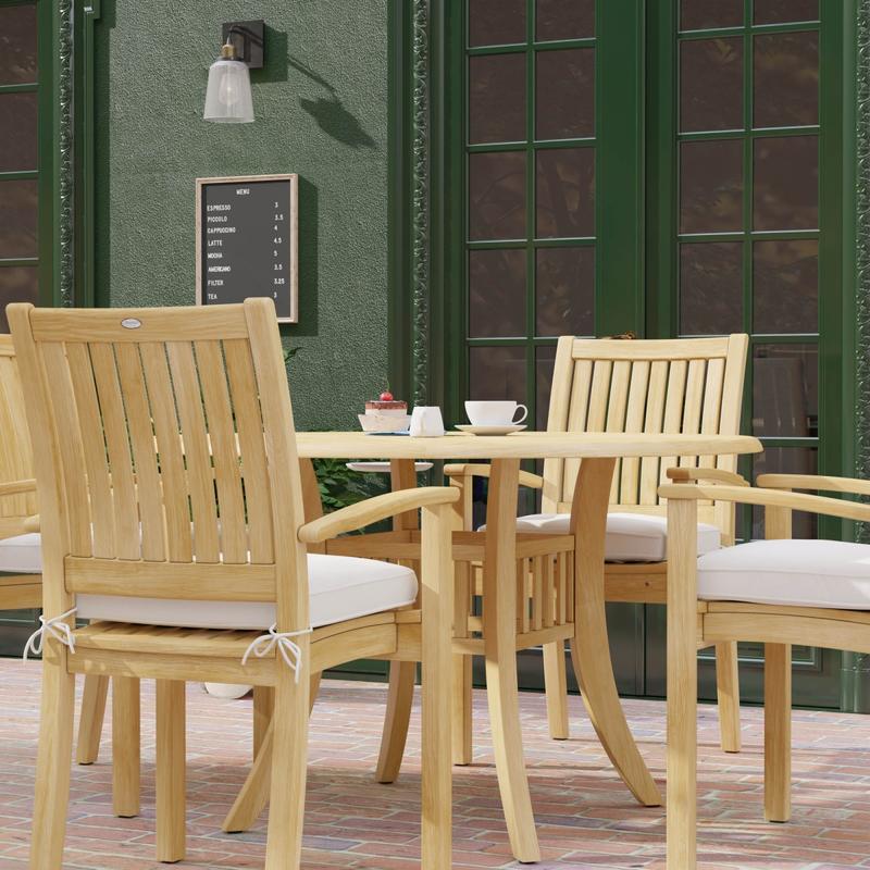 alt="70027 Grand Hyatt 5 pc Dining Set on brick patio showing closeup side view of 3 dining chairs with optional seat cushions outdoors with glass doors in background"
