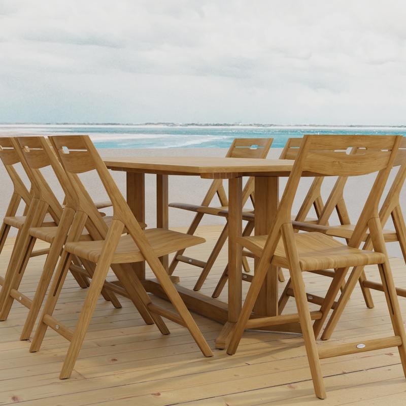 alt="70464 Surf Pyramid Teak Dining Set for 8 angled side view on outdoor terrace with the ocean and sky in the background "