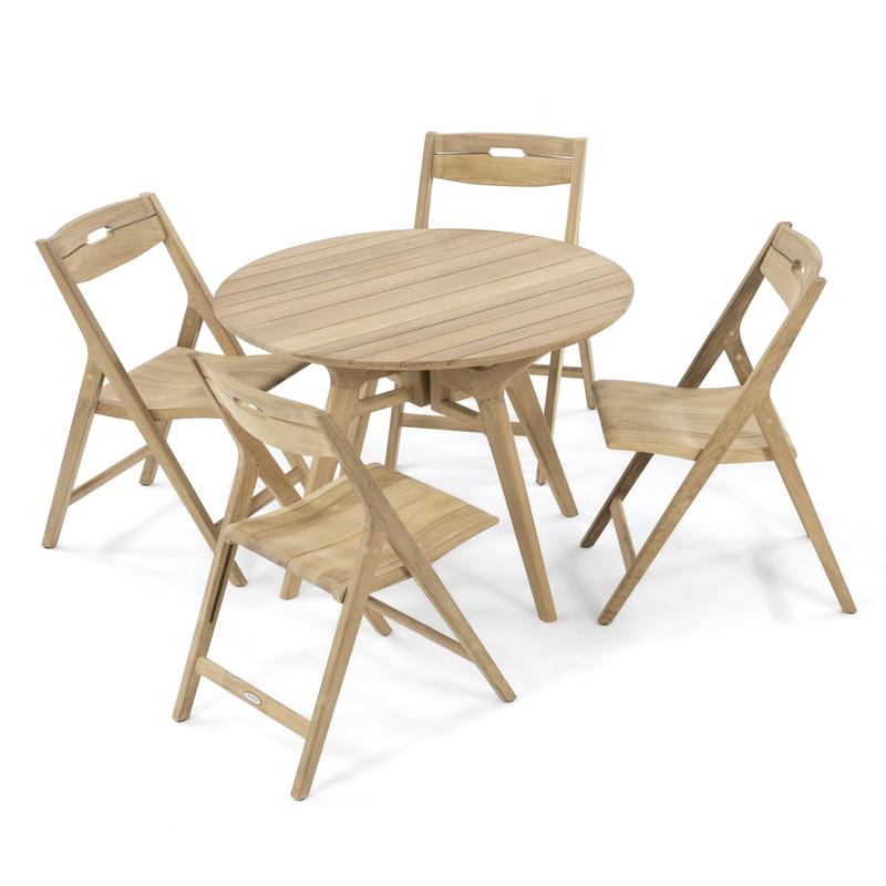 alt="70811 Surf Yacht teak round 42 inch Folding 5 piece Dining Set on terrace showing with 2 potted plants and book on table next to potted tree with mountain background"