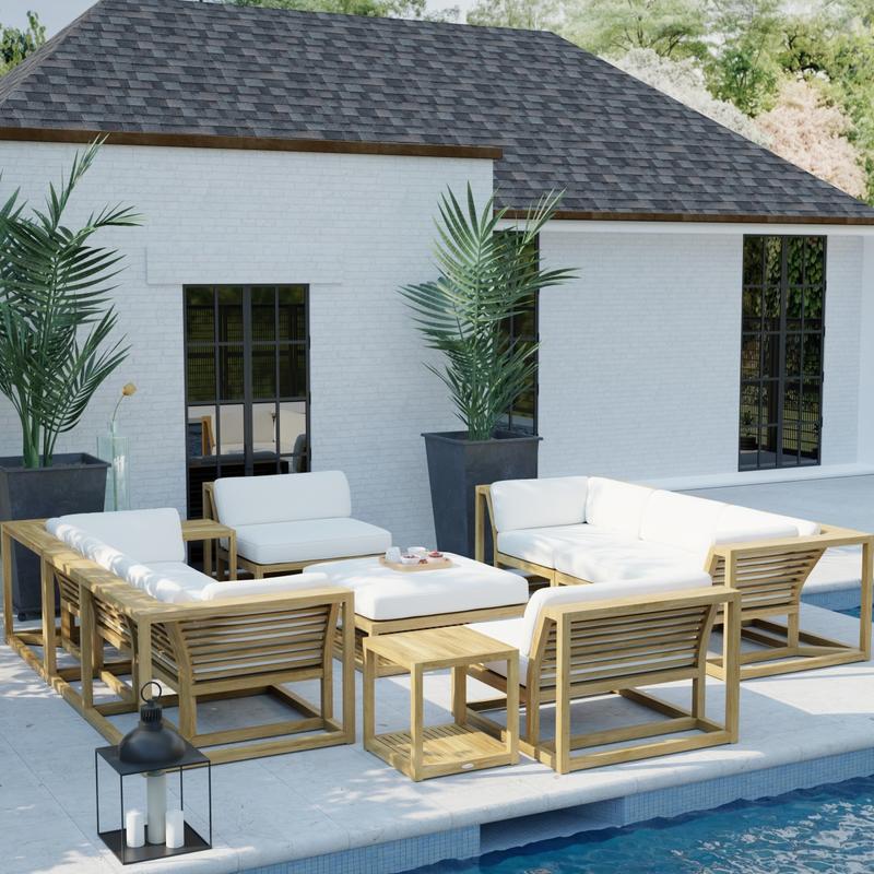 alt="70753 Maya 7 pc Twin Sofa Set in angled view on pool deck next to a pool with a potted plant and lantern and house in the background"