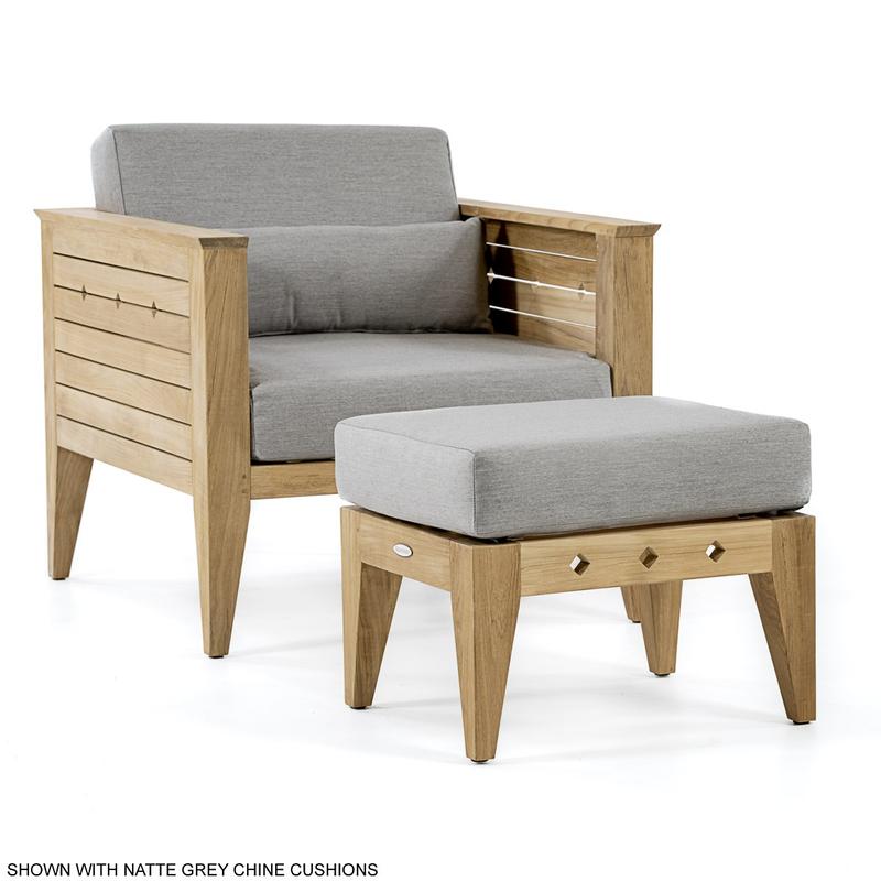 alt="12160dp Craftsman teak armchair and ottoman with cushions angled view on white background"