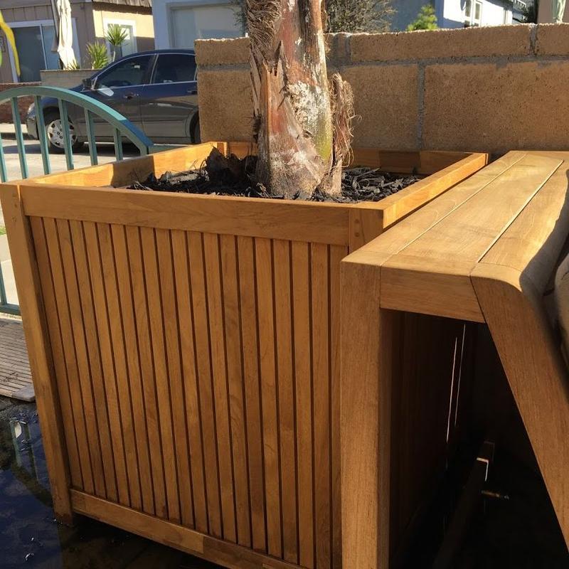 alt="18132 cube planter angled view  on deck patio beside sectional"