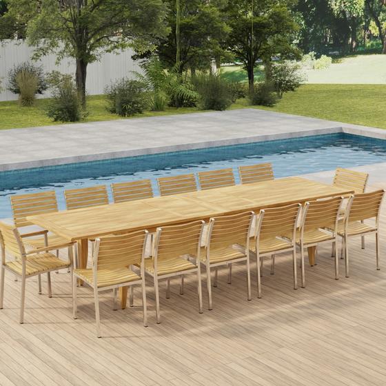 70352 Laguna Vogue 15 piece teak Dining Set of 14 dining armchair and rectangular 11 foot extendable dining table in angled aerial side view on pavers with pool in background