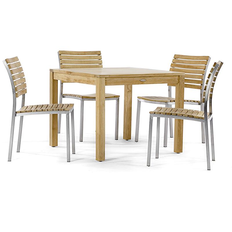 alt="70426 Vogue 5 piece Cafe Set of Bistro Teak 36" Square Dining Table and 4 Vogue teak and stainless steel side chairs in corner view on white background "