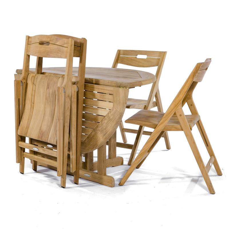 alt="70474 Surf Barbuda Folding 5 piece Dining Set showing 2 chairs folded leaning against table folded in half on white background"