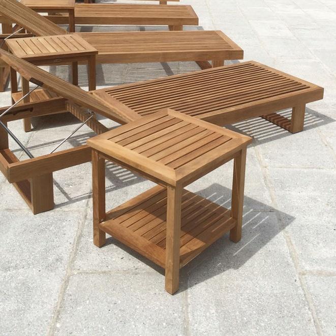 alt="14107 Veranda Teak End Tables with horizon loungers on concrete patio"