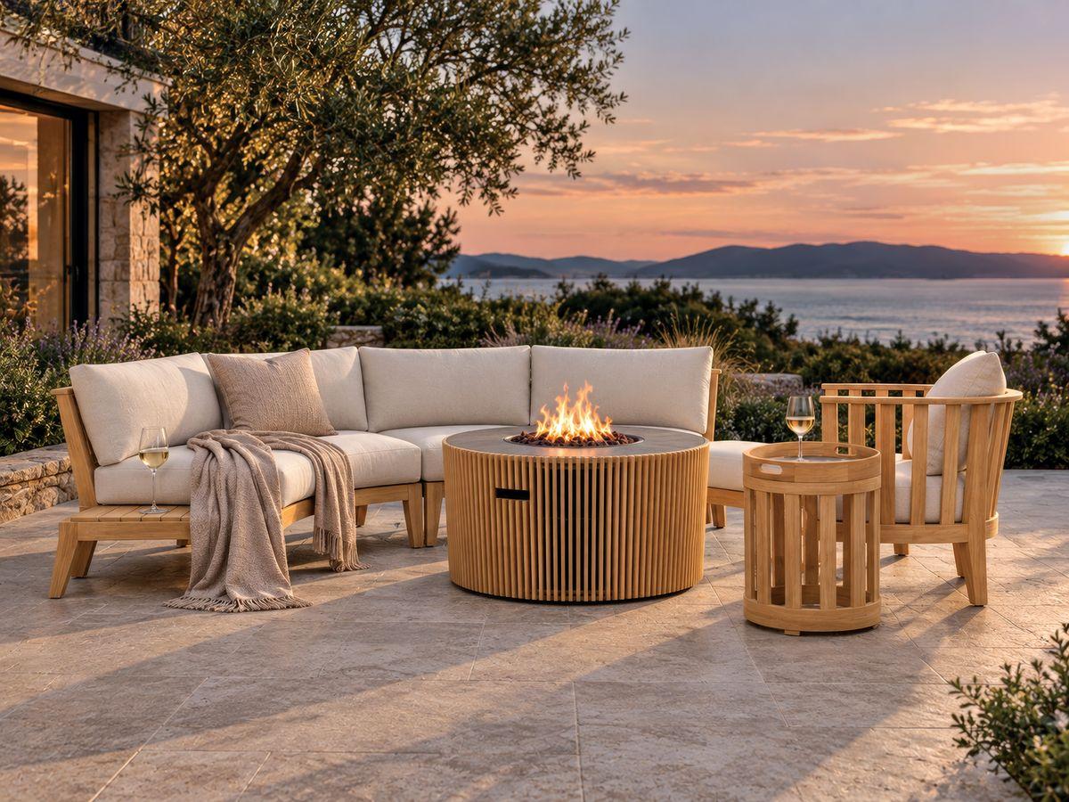 Kafelonia curved sectional on a seaside terrace at sunset