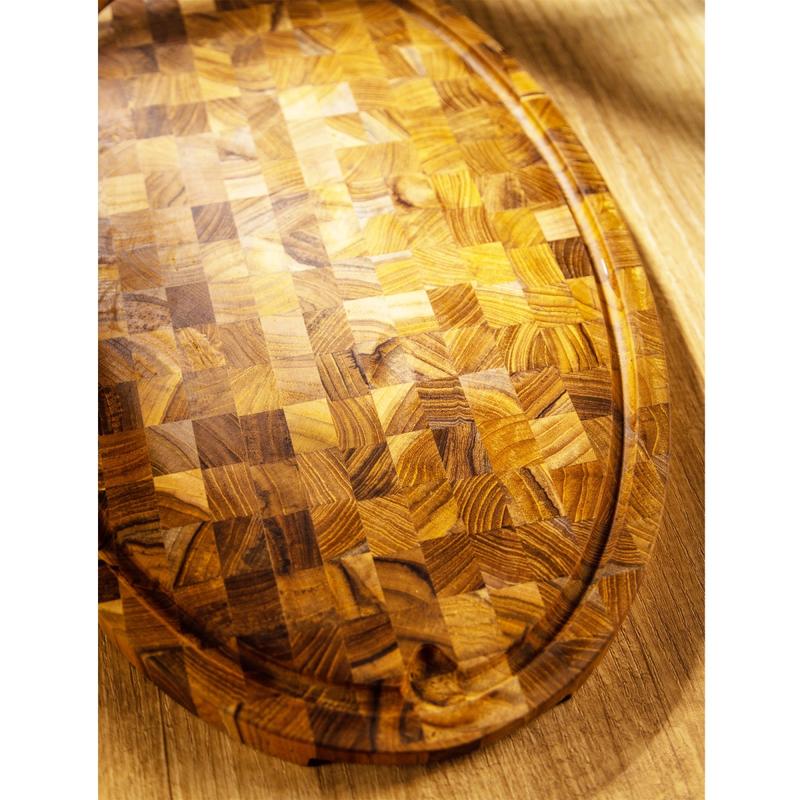 alt="19125 Butcher Block 20 inch Oval Charcuterie Cutting Board showing closeup view of the cutting board on a counter top"