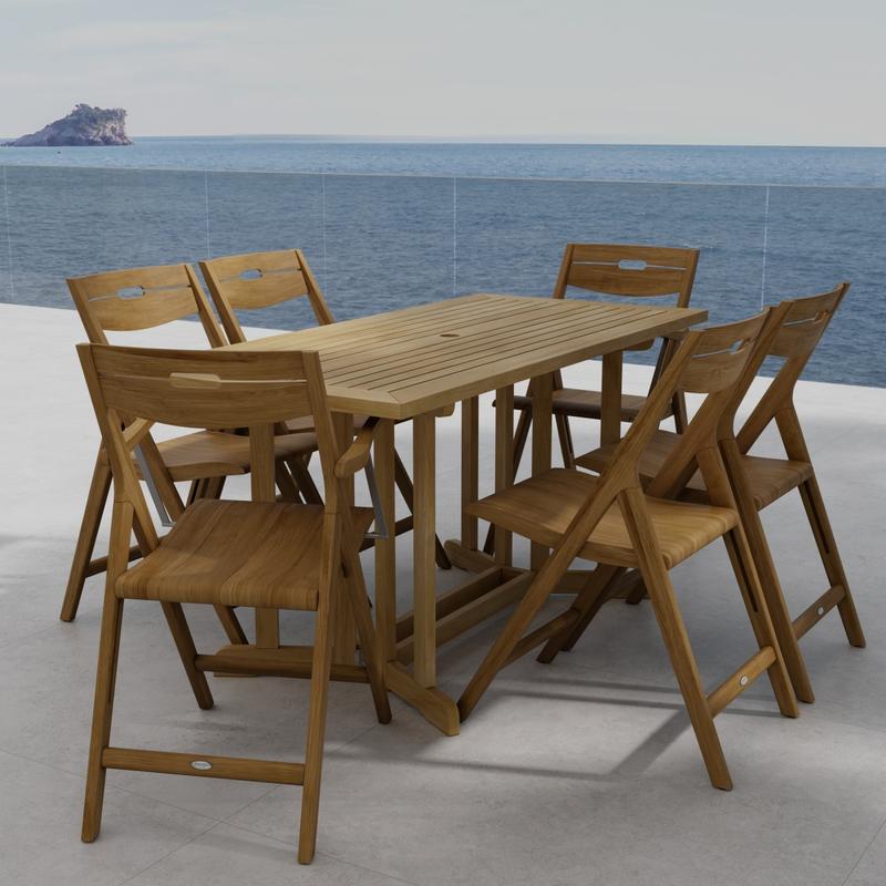 alt="70146 Surf Nevis Teak 7 pc Dining Set of Nevis Dining Table and 2 Surf Dining Chairs and 4 Surf Side Chairs angled end view on tile patio overlooking the ocean in background"