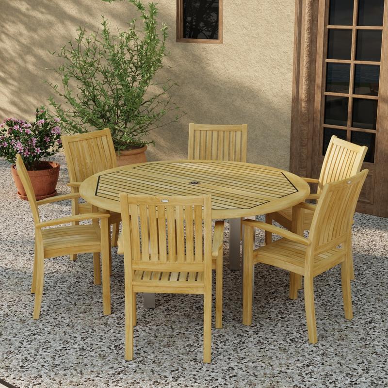 alt="70358 Vogue Sussex 7 pc Dining Set of Vogue 60 inch Round Table and 6 Sussex Armchairs in angled top view on patio with 2 potted plants next to window and french door in background"