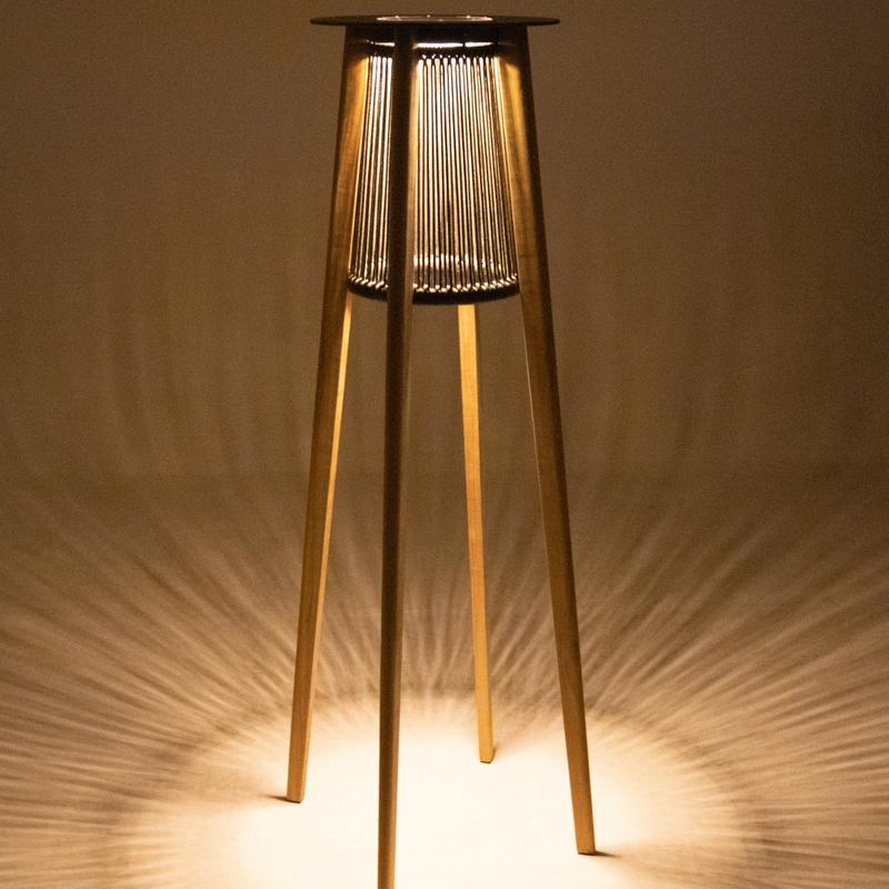 alt="45102 Luna Standing Lamp in side view showing light reflecting from bottom on white background"