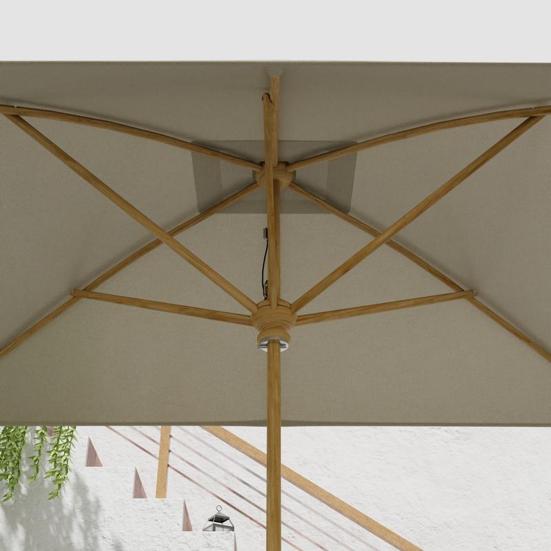 alt="17640F Grand 10 feet Rectangular teak Umbrella with white canvas canopy extended showing the underside of the umbrella canopy and shaft and stretchers with staircase in background"