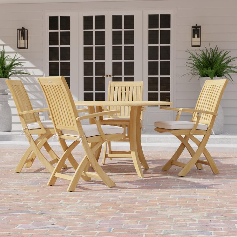 alt="70043 Grand Hyatt Barbuda 5 pc Patio Dining Set of Grand Hyatt Dining Table and 4 Barbuda Folding Chairs on a brick paver patio with french doors and 2 potted ferns in background"