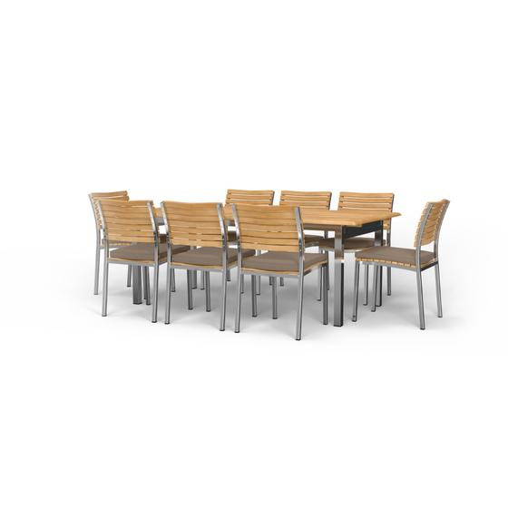 70756 Vogue 7 pc Dining Set of 6 Vogue Stacking Dining Chairs with optional seat cushions and Vogue Rectangular Dining Table in angled side view on white background