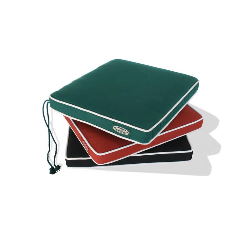 alt="image of three 72810MTO cushions on top of each other in Forest Green, Teracotta, and Navy Blue on white background"