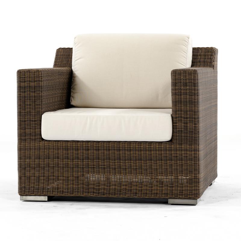 alt="31001dp Malaga deep seat synthetic wicker armchair with cushions on tile pool deck with infinity pool and ocean in background"