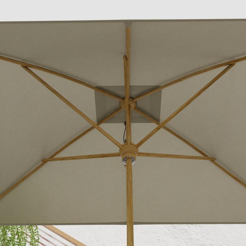alt="17640F Grand 10 feet Rectangular teak Umbrella with white canvas canopy extended showing closeup of the underside of the umbrella canopy and shaft and stretchers "