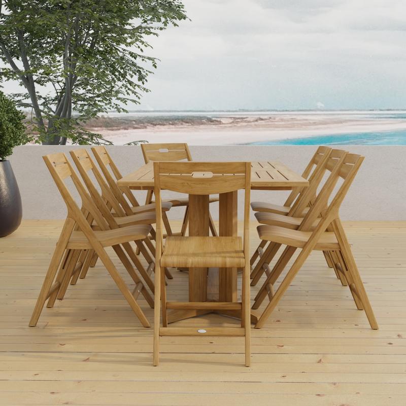 alt="70464 Surf Pyramid Teak Dining Set for 8 end view on outdoor terrace with trees and ocean in background "