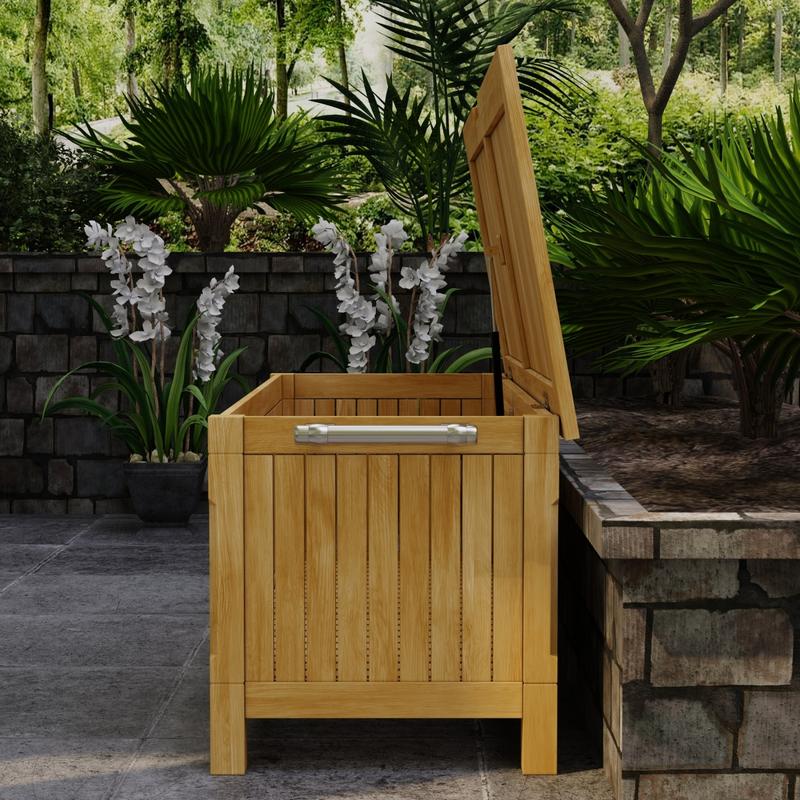 alt="18203 somerset rectangular storage box in side view with open lid on deck with landscape plants in background"