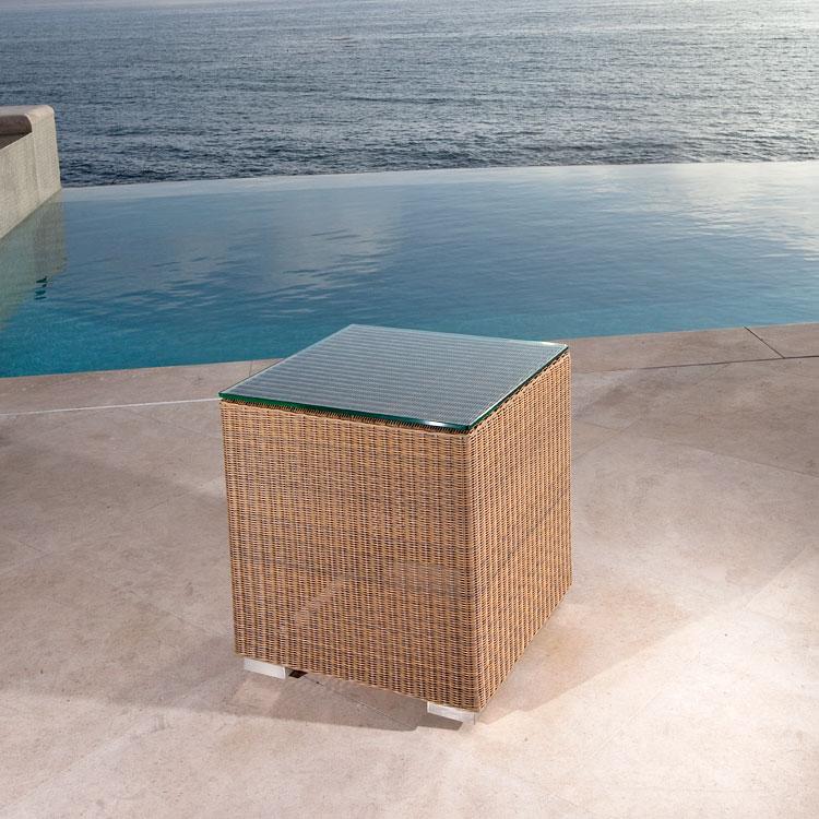 alt="31007SG Malaga Side Table- Stool in Summer Grass on concrete patio overlooking pool and ocean"